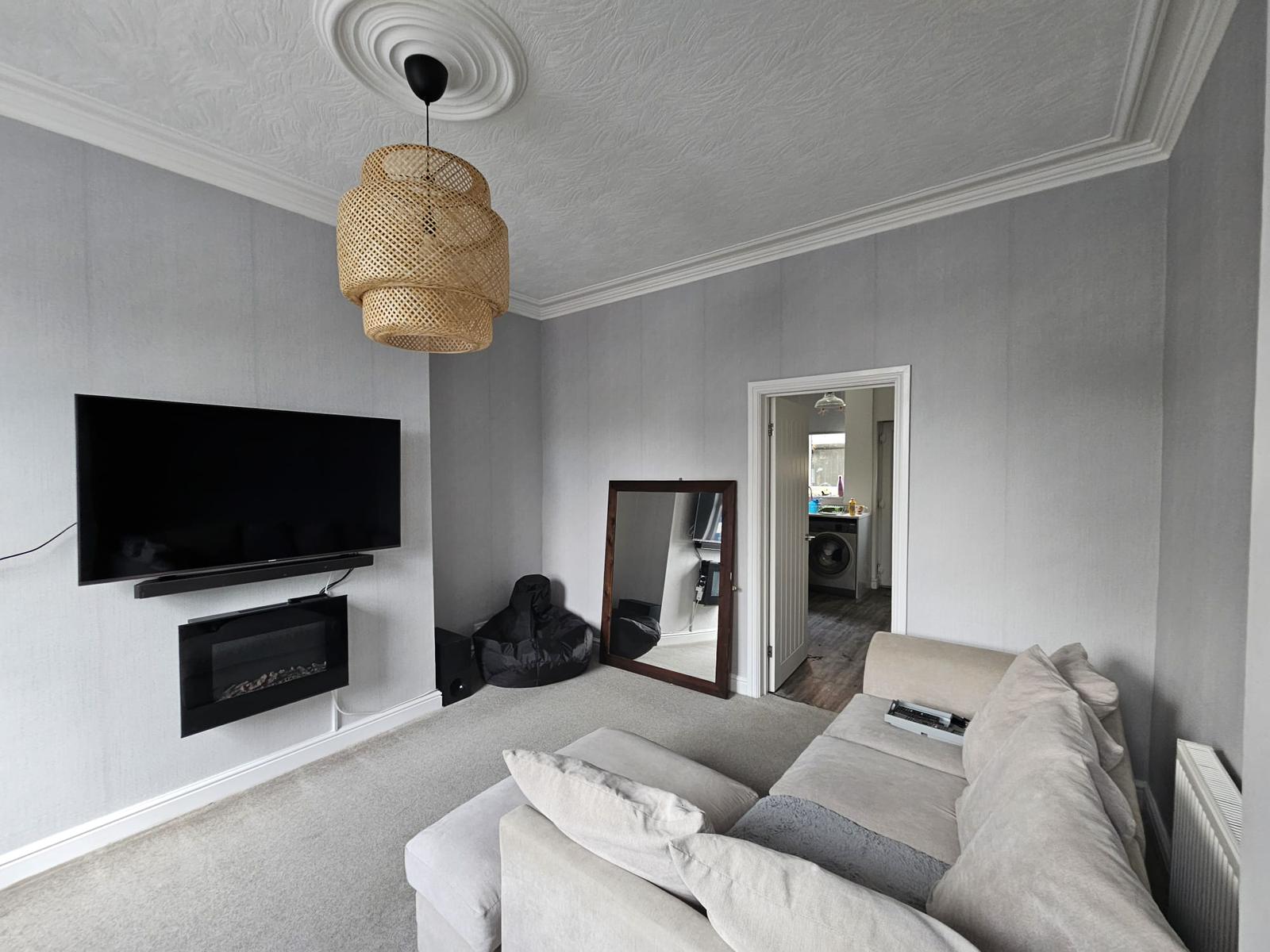 Wallpapering 2 Completed interior painting project Manchester living room grey walls
